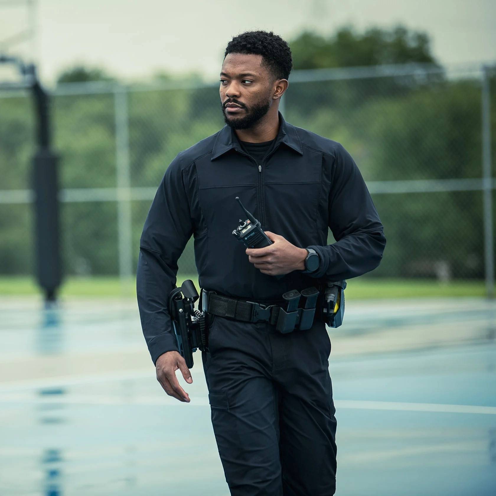 Uniformed officer looking left